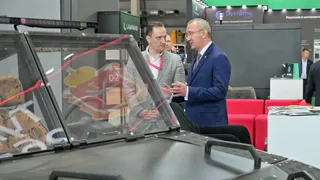 Калужская область представила на ИННОПРОМЕ-2026 кроссовер, вездеход-трансформер и умную дорожную технику